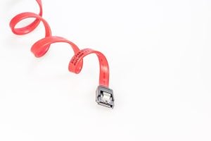 A photo of a SATA drive cable that's been curled
