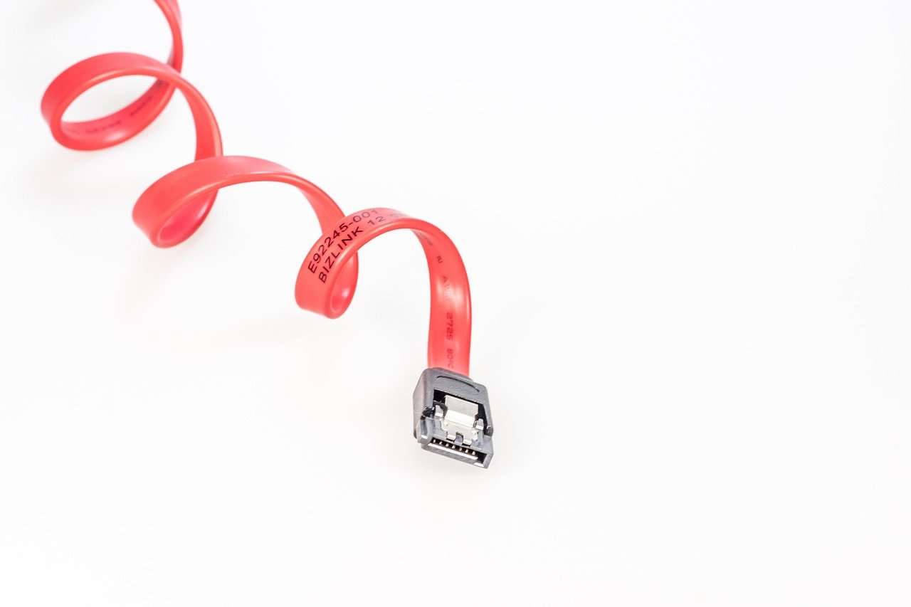 A photo of a SATA drive cable that's been curled