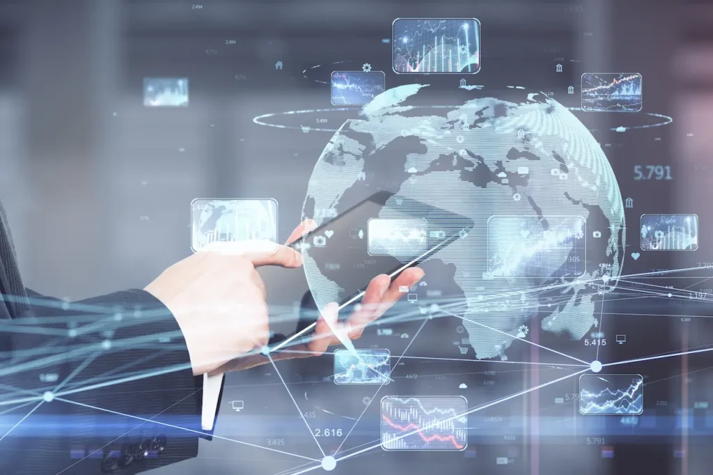 Hands holding tablet with digital global data overlay