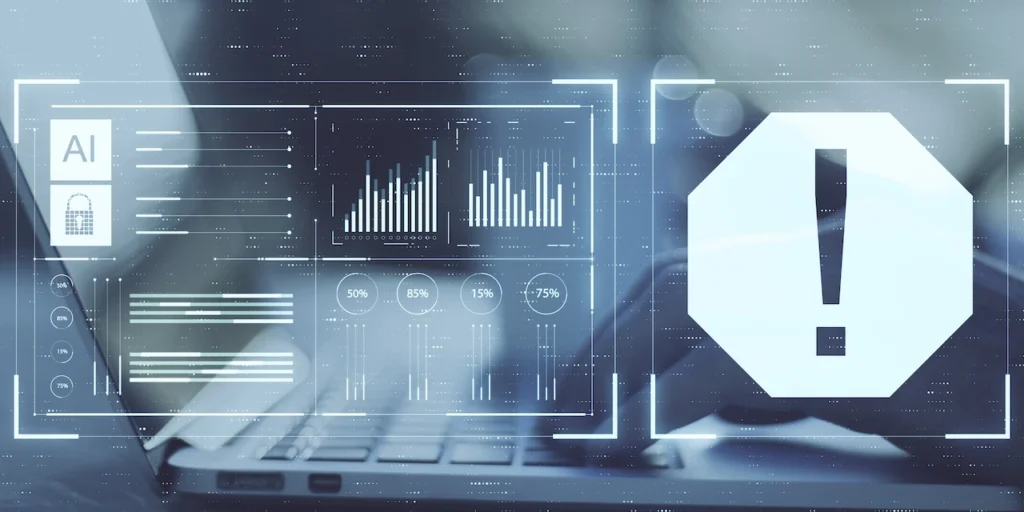 AI dashboard with warning symbol on laptop screen