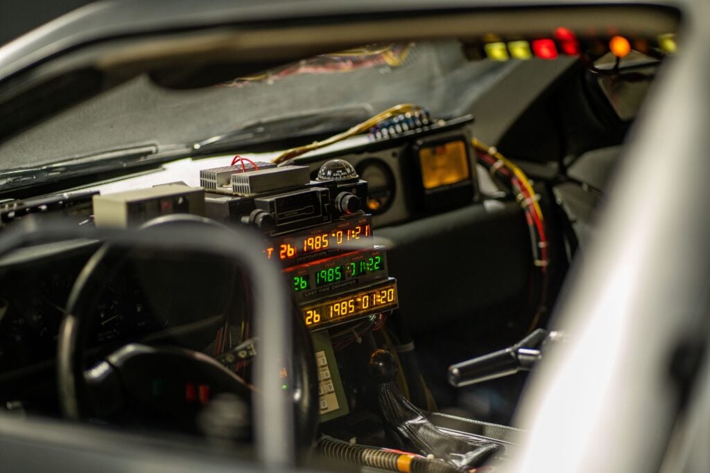 DeLorean time machine dashboard with glowing date displays