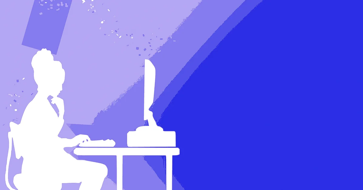 A silhouette of a woman at a computer on a desk.